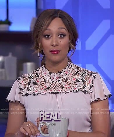 Tamera's nude floral embroidered top and jeans on The Real