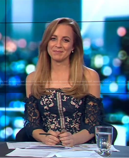 Carrie's navy off shoulder lace dress on The Project