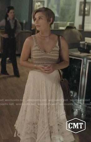 Scarlett's beige knitted top and white midi skirt on Nashville