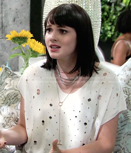 Tessa's white distressed top on The Young and the Restless