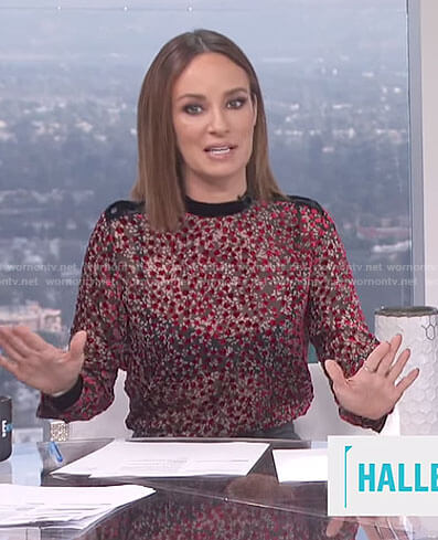 Catt's red dotted top on E! News Daily Pop