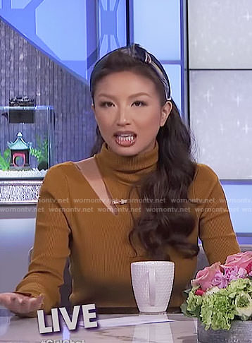 Jeannie's yellow cutout turtleneck top and pants on The Real