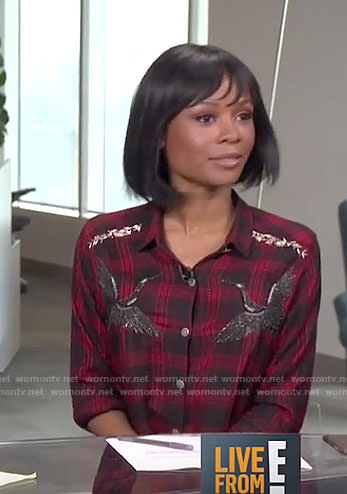 Zuri's red plaid stork shirt on Live from E!