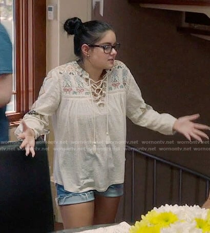 Alex's cream embroidered lace-up top on Modern Family