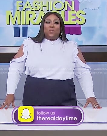 Loni's blue ruffle cold shoulder top on The Real