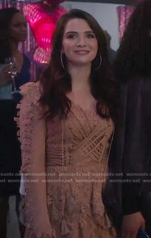 Jane's beige lace dress with lace-up details on The Bold Type