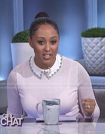 Tamera's pink mesh sleeve sweater and printed skirt on The Real
