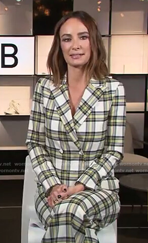 Catt's plaid jumpsuit and jacket on E! News Daily Pop