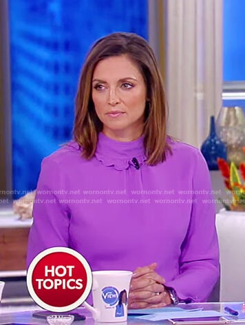 Paula's purple ruffle neck long sleeved top on The View