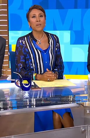 Robin's blue mixed print blouse and wrap skirt on Good Morning America