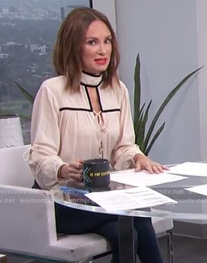 Catt's white contrast tie blouse on E! News Daily Pop