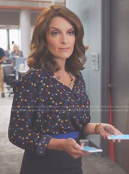 Diana's black geometric print blouse on Great News