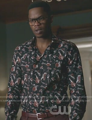 Jeff's black musical instrument shirt on Dynasty