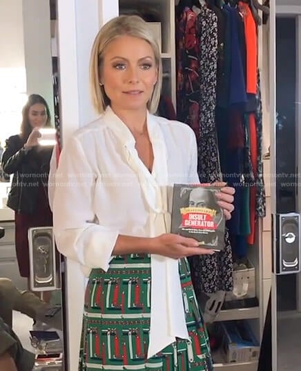 Kelly's white tie neck blouse and green printed skirt on Live with Kelly and Ryan