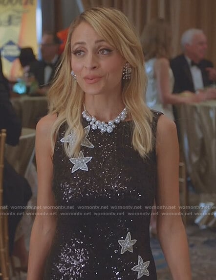 Portia's black sequin star dress on Great News