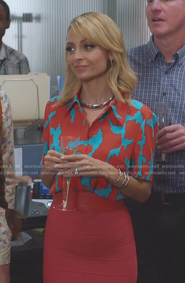 Portia's orange and blue printed shirt and orange bandage skirt on Great News