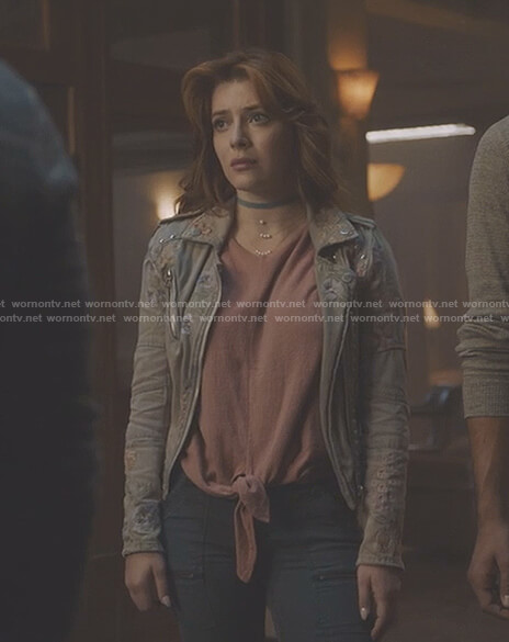 Sonia's pink tie front top and floral embroidered moto jacket on The Gifted