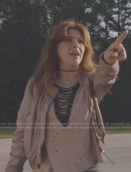 Sonia's pink distressed lace-up top on The Gifted
