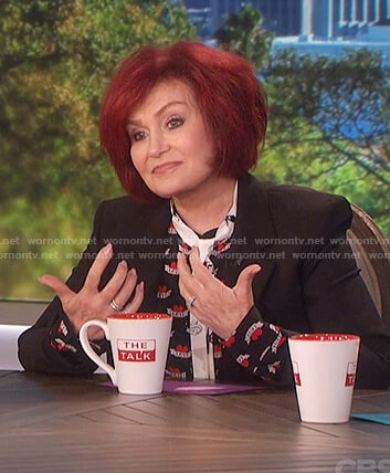 Sharon's black heart print tie neck top on The Talk