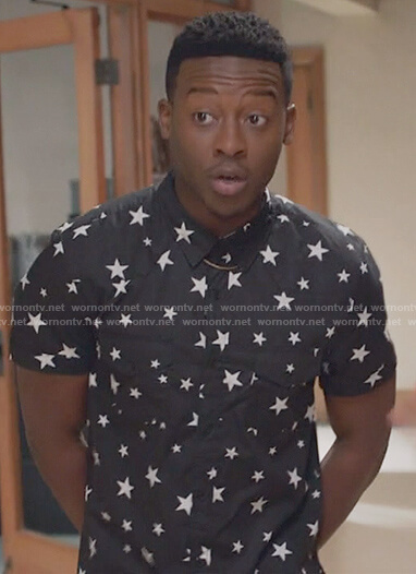 Courtney's black star print shirt on The Mayor