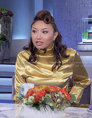 Jeannie's gold metallic long sleeve top on The Real