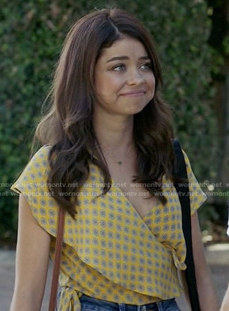Haley's yellow printed wrap top on Modern Family