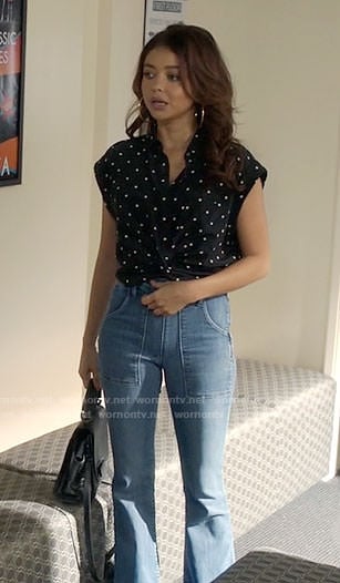 Haley's black square dotted crop top and flare jeans on Modern Family