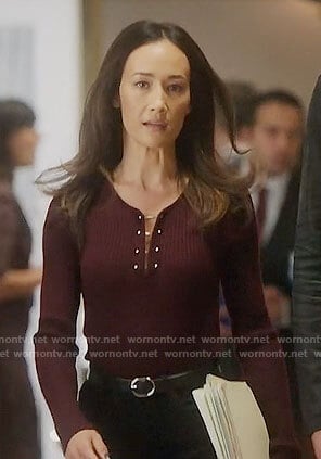 Hannah's burgundy barbell top on Designated Survivor