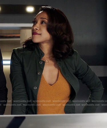 Iris's orange knit top on The Flash