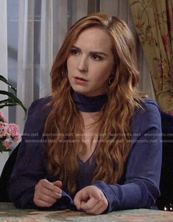 Mariah's blue choker neck blouse on The Young and the Restless