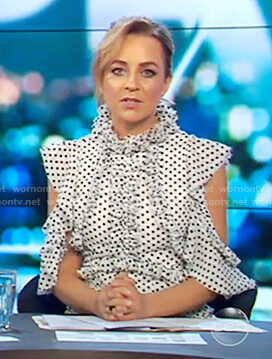 Carrie's polka dot ruffle front dress on The Project