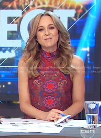 Carrie's red embroidered floral lace top on The Project