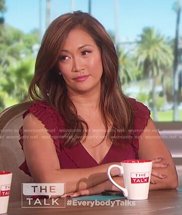 Carrie Inaba's red ruffle wrap dress on The Talk