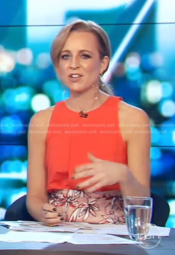 Carrie's red top and floral printed skirt on The Project