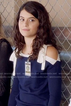 Sabrina's navy sweater with tie shoulders on The Mick