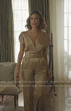 Cristal's gold v-neck jumpsuit on Dynasty