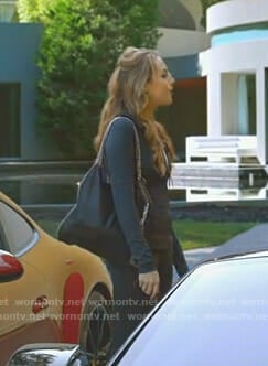 Fallon's black chain bag on Dynasty