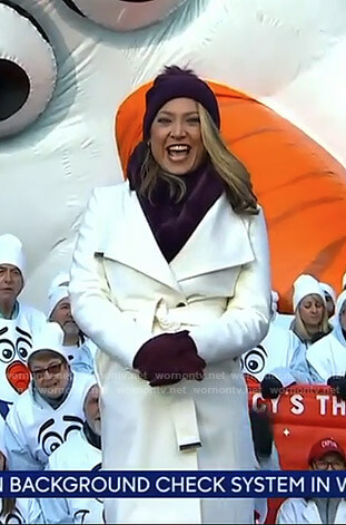 Ginger's white coat and purple pom pom beanie on Good Morning America