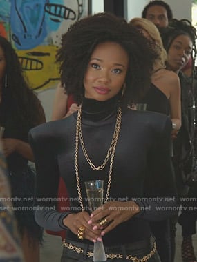 Monica's black velvet turtleneck top on Dynasty