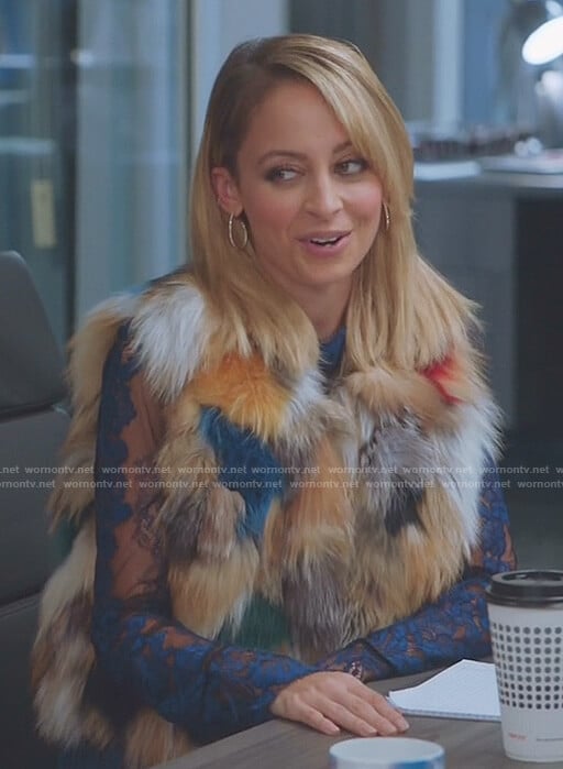 Portia's multi-color fur vest on Great News