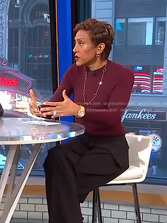 Robin's red mock neck top and black wrapped pants on Good Morning America