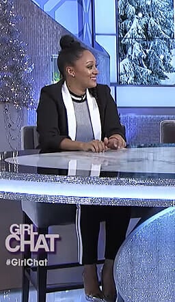 Tamera's silver knit top and side striped pants on The Real