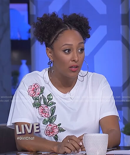 Tamera's white sequined flower top and black button front skirt on The Real
