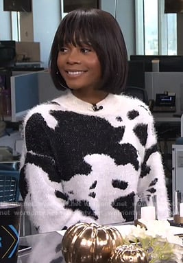 Zuri's cow print fluffy sweater on Live from E!
