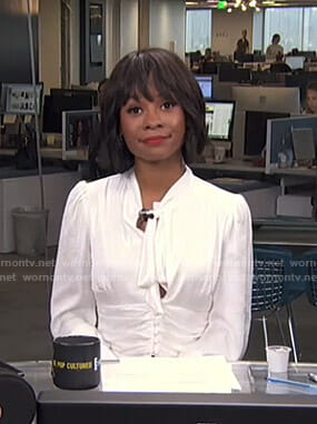 Zuri's white tie neck blouse on Live from E!
