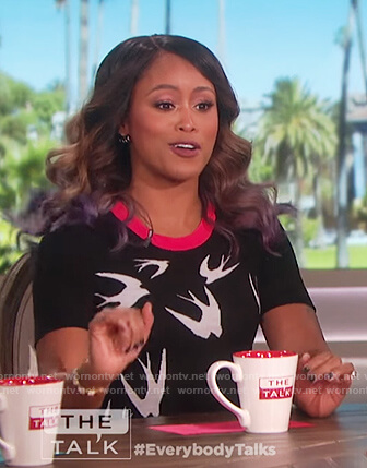 Eve's black swallow knitted top on The Talk