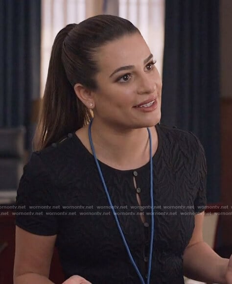 Valentina's black textured flare dress on The Mayor