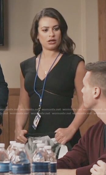 Valentina's black v-neck textured flare dress on The Mayor