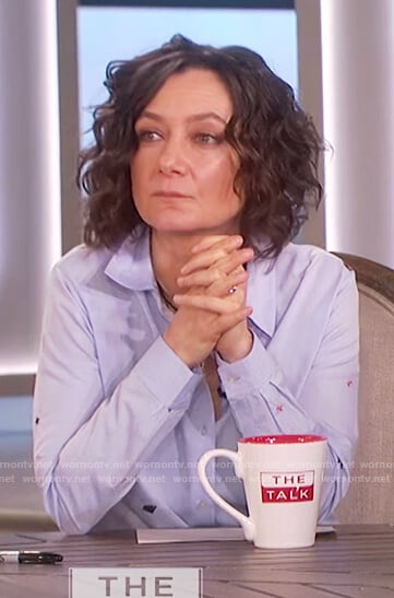 Sara's blue embroidered graphic long sleeve shirt on The Talk
