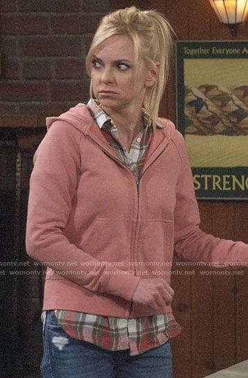 Christy's red and brown plaid shirt and pink hoodie on Mom